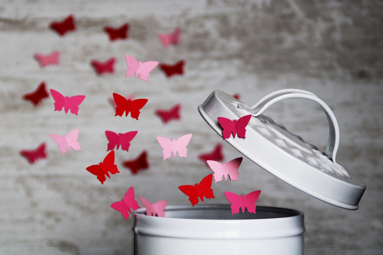 butterflies leaving a trash can